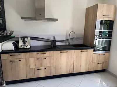 Cuisine ou kitchenette dans l'établissement Maison