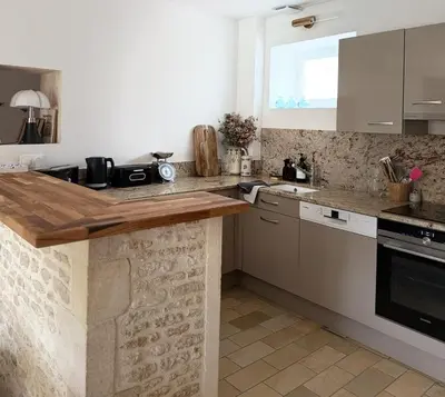 Cuisine ou kitchenette dans l'établissement Le Nid de Plumetot - Maison de Charme en Normandie