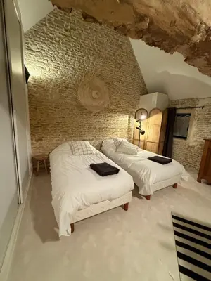 Un ou plusieurs lits dans un hébergement de l'établissement Le Nid de Plumetot - Maison de Charme en Normandie