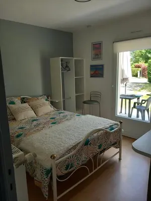 Un ou plusieurs lits dans un hébergement de l'établissement La chambre de Carole