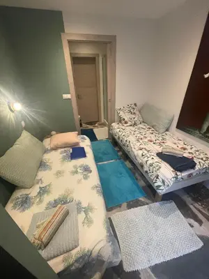 Un ou plusieurs lits dans un hébergement de l'établissement Chambre twin Casquets dans une maison, idéale randonneurs et cyclistes - GR223