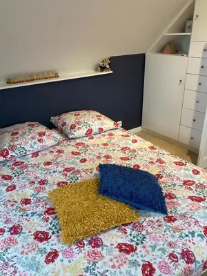 Un ou plusieurs lits dans un hébergement de l'établissement Jolie Maison avec piscine, proche Mt St Michel