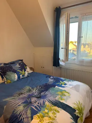 Un ou plusieurs lits dans un hébergement de l'établissement Appartement 2 minutes de la plage