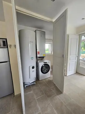 Cuisine ou kitchenette dans l'établissement Gîte le bûcher du château