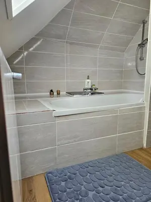 Salle de bains dans l'établissement Gîte le bûcher du château