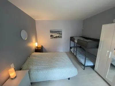 Un ou plusieurs lits dans un hébergement de l'établissement D-Day Cottage La Maove