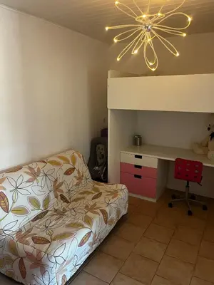 Un ou plusieurs lits dans un hébergement de l'établissement Villa Riva-Mela
