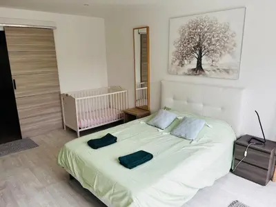 Un ou plusieurs lits dans un hébergement de l'établissement Villa Riva-Mela