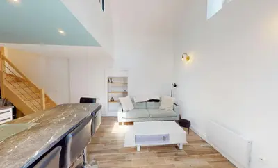 Coin salon dans l'établissement Maison cosy à 2 pas de la mer - Séjour à deux