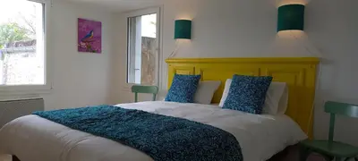 Un ou plusieurs lits dans un hébergement de l'établissement Retour de plage