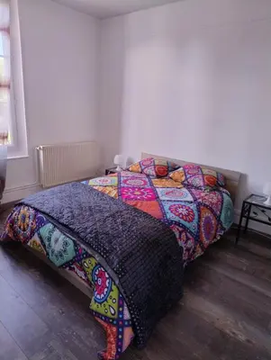 Un ou plusieurs lits dans un hébergement de l'établissement APPARTEMENT COMPLET 