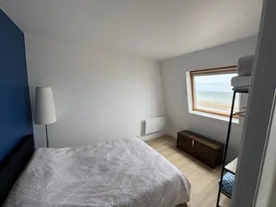 Un ou plusieurs lits dans un hébergement de l'établissement Appartement Effet Mer