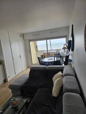 Coin salon dans l'établissement Appartement Effet Mer