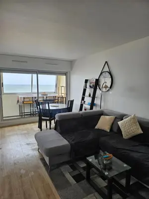 Coin salon dans l'établissement Appartement Effet Mer