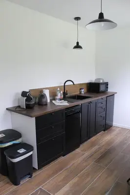 Cuisine ou kitchenette dans l'établissement Les Coquelets