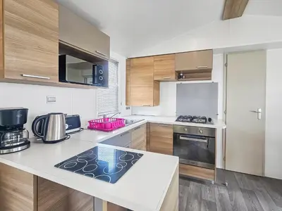Cuisine ou kitchenette dans l'établissement Pause à Litteau