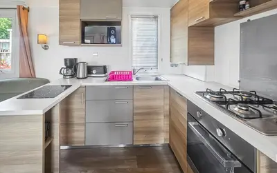 Cuisine ou kitchenette dans l'établissement Pause à Litteau