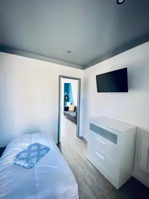 Télévision ou salle de divertissement dans l'établissement Au Bords des Embruns 4 personnes