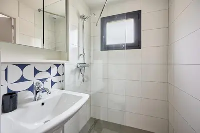 Salle de bains dans l'établissement Margaux - Proche du Port