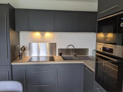 Cuisine ou kitchenette dans l'établissement Les petites maisons dans la monterie - Le Jardin -
