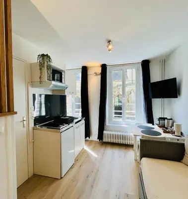Cuisine ou kitchenette dans l'établissement Le Petit Guillaume