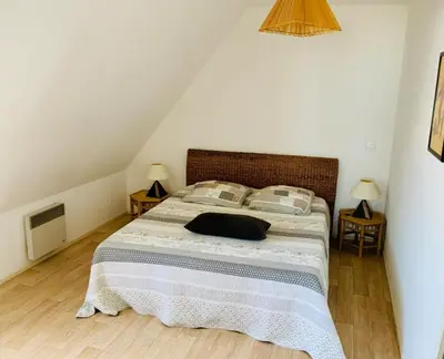 Un ou plusieurs lits dans un hébergement de l'établissement L'écluse appartement vue sur mer