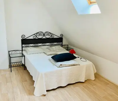 Un ou plusieurs lits dans un hébergement de l'établissement L'écluse appartement vue sur mer