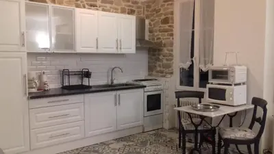 Cuisine ou kitchenette dans l'établissement Simadline
