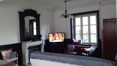 Télévision ou salle de divertissement dans l'établissement Simadline