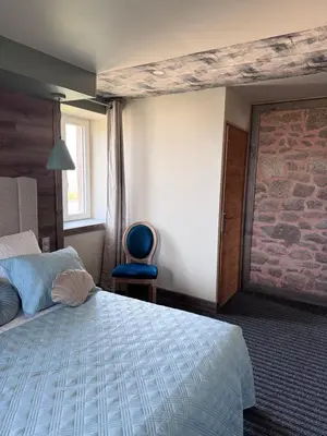 Un ou plusieurs lits dans un hébergement de l'établissement Villa huit chambres