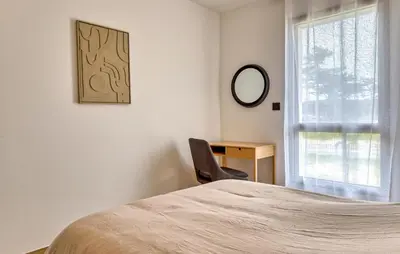 Un ou plusieurs lits dans un hébergement de l'établissement Villa Les Oyats