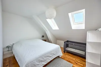 Un ou plusieurs lits dans un hébergement de l'établissement Le Nid Maritime - duplex proche de la plage