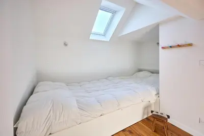 Un ou plusieurs lits dans un hébergement de l'établissement Le Nid Maritime - duplex proche de la plage