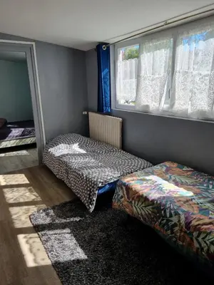 Un ou plusieurs lits dans un hébergement de l'établissement Logement à 100m de la mer