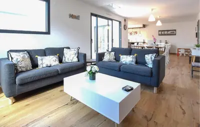 Coin salon dans l'établissement Maison Moderne Proche Plage