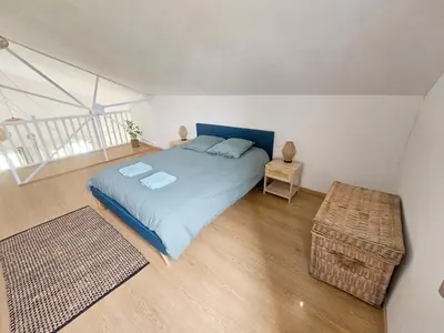 Un ou plusieurs lits dans un hébergement de l'établissement La Parenthèse Normande, Location maison avec jardin