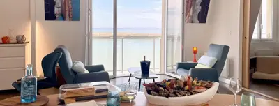 Coin salon dans l'établissement Fenêtre sur Mer I CAP MER