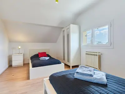 Un ou plusieurs lits dans un hébergement de l'établissement Holiday Home Bellevue by Interhome