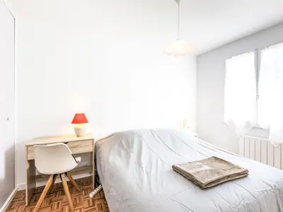 Un ou plusieurs lits dans un hébergement de l'établissement Holiday Home Le Petit Moulin by Interhome