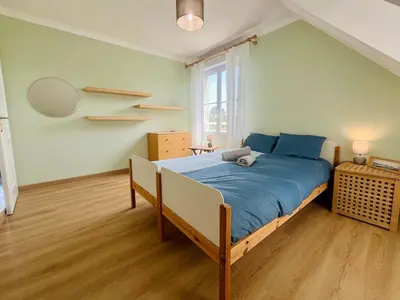 Un ou plusieurs lits dans un hébergement de l'établissement Les pieds dans l eau Home - Waterfront Stay
