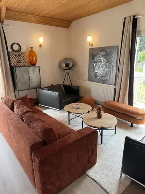Coin salon dans l'établissement Le Loft Corail