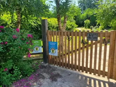 Jardin de l'établissement Le Jardin des Papillons, gîte et chambre d'hôtes à Saint Fraimbault