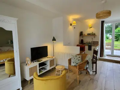 Télévision ou salle de divertissement dans l'établissement Le Jardin des Papillons, gîte et chambre d'hôtes à Saint Fraimbault