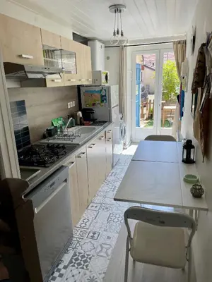 Cuisine ou kitchenette dans l'établissement La Victoire