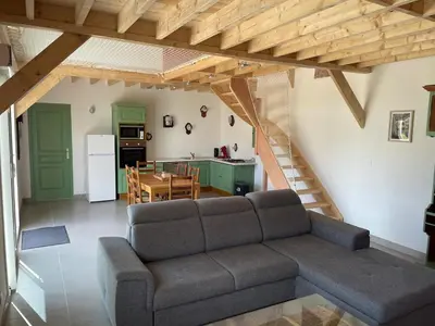 Coin salon dans l'établissement Les Petits Crapauds Gîte