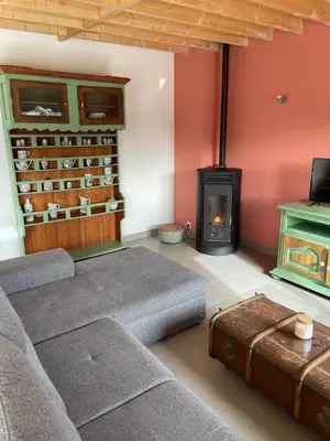 Coin salon dans l'établissement Les Petits Crapauds Gîte