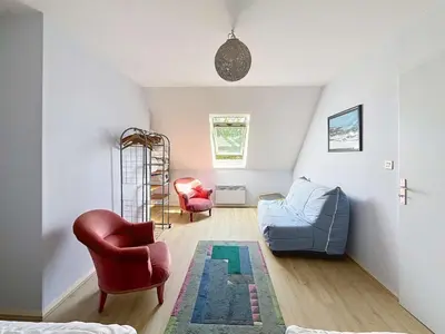 Coin salon dans l'établissement Villa 6 pièces, 9 pers, à 50m plage avec Wifi - FR-1-361-567