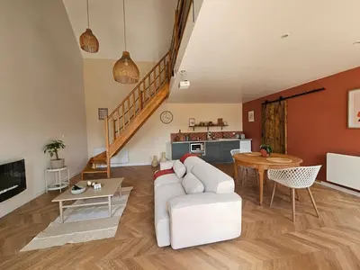 Coin salon dans l'établissement Gîtes Nos jours heureux - L'idylle, gîte de caractère