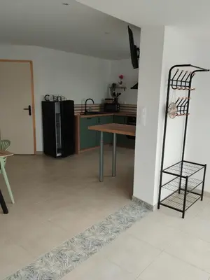 Cuisine ou kitchenette dans l'établissement Maison de vacances à la plage