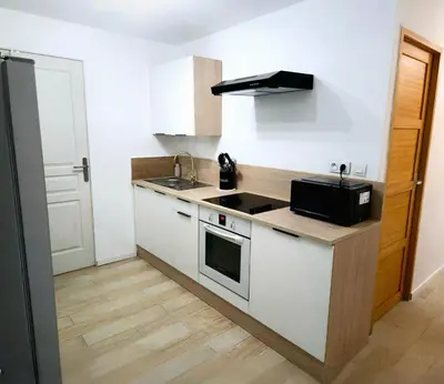 Cuisine ou kitchenette dans l'établissement Logement Cosy & Spacieux Hypercentre CAEN